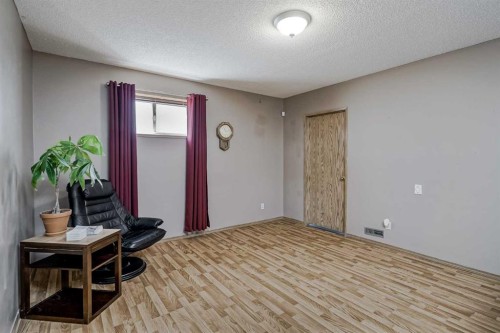 47 Harvest Glen Rise Ne, Calgary, AB - Indoor Photo Showing Other Room