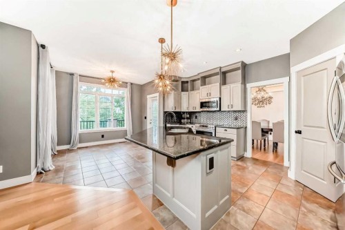 2 Tuscany Estates Crescent Nw, Calgary, AB - Indoor Photo Showing Kitchen With Double Sink