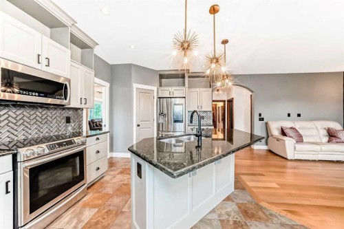 2 Tuscany Estates Crescent Nw, Calgary, AB - Indoor Photo Showing Kitchen With Double Sink With Upgraded Kitchen