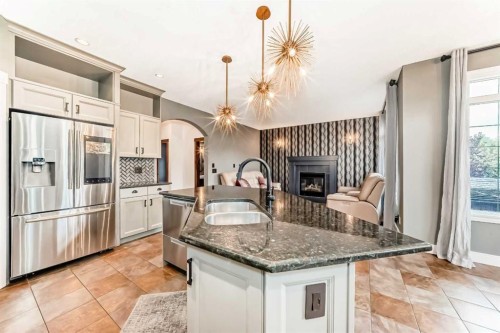 2 Tuscany Estates Crescent Nw, Calgary, AB - Indoor Photo Showing Kitchen With Double Sink With Upgraded Kitchen