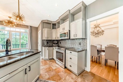 2 Tuscany Estates Crescent Nw, Calgary, AB - Indoor Photo Showing Kitchen With Double Sink