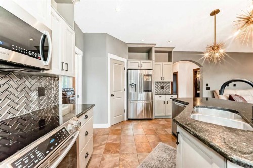 2 Tuscany Estates Crescent Nw, Calgary, AB - Indoor Photo Showing Kitchen With Double Sink With Upgraded Kitchen
