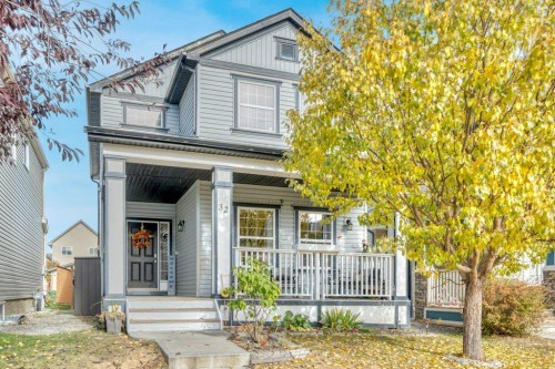 32 Copperpond Heights Se, Calgary, AB - Outdoor With Deck Patio Veranda With Facade