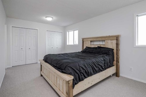 4 Bridleridge Circle Sw, Calgary, AB - Indoor Photo Showing Bedroom
