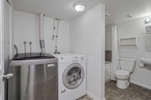 4 Bridleridge Circle Sw, Calgary, AB - Indoor Photo Showing Laundry Room