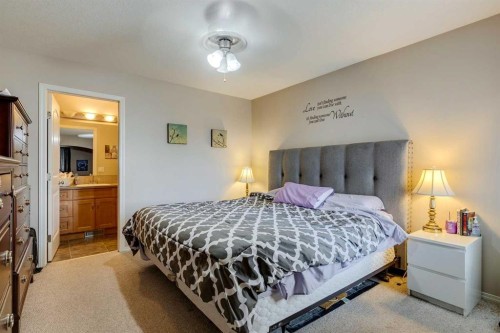 184 Cimarron Park Circle, Okotoks, AB - Indoor Photo Showing Bedroom