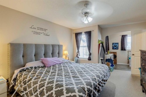 184 Cimarron Park Circle, Okotoks, AB - Indoor Photo Showing Bedroom