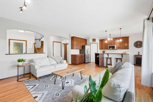 155 Sunset Close, Cochrane, AB - Indoor Photo Showing Living Room