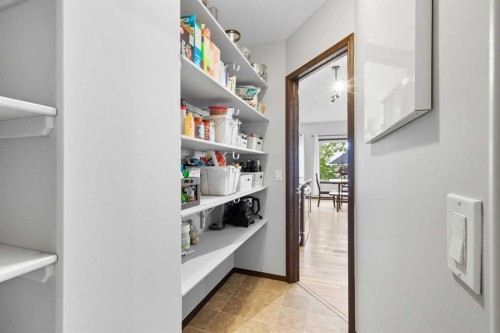 155 Sunset Close, Cochrane, AB - Indoor With Storage