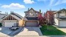 155 Sunset Close, Cochrane, AB  - Outdoor With Facade 