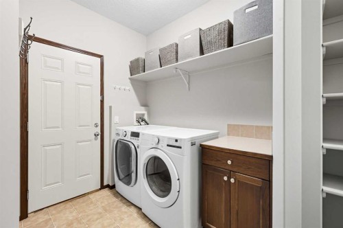 155 Sunset Close, Cochrane, AB - Indoor Photo Showing Laundry Room