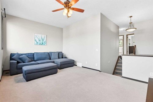 155 Sunset Close, Cochrane, AB - Indoor Photo Showing Living Room