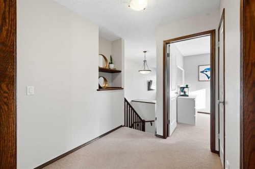 155 Sunset Close, Cochrane, AB - Indoor Photo Showing Other Room