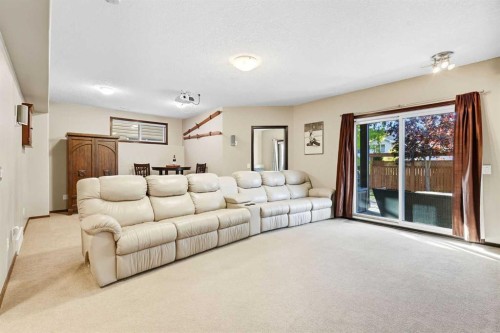 155 Sunset Close, Cochrane, AB - Indoor Photo Showing Living Room