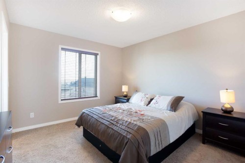28 Kinlea Link Nw, Calgary, AB - Indoor Photo Showing Bedroom