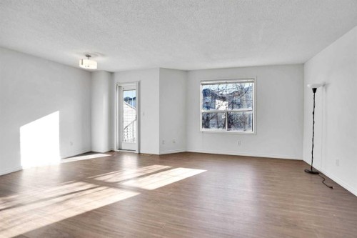 234 Taracove Place Ne, Calgary, AB - Indoor Photo Showing Living Room