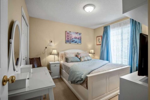 85 Bridleridge Road Sw, Calgary, AB - Indoor Photo Showing Bedroom