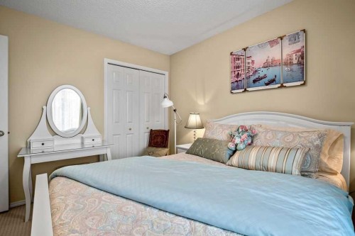 85 Bridleridge Road Sw, Calgary, AB - Indoor Photo Showing Bedroom