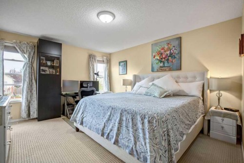 85 Bridleridge Road Sw, Calgary, AB - Indoor Photo Showing Bedroom