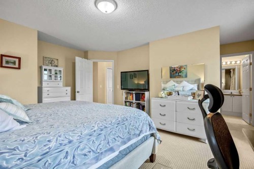 85 Bridleridge Road Sw, Calgary, AB - Indoor Photo Showing Bedroom