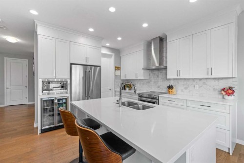 240 Cranbrook Circle Se, Calgary, AB - Indoor Photo Showing Kitchen With Stainless Steel Kitchen With Double Sink With Upgraded Kitchen