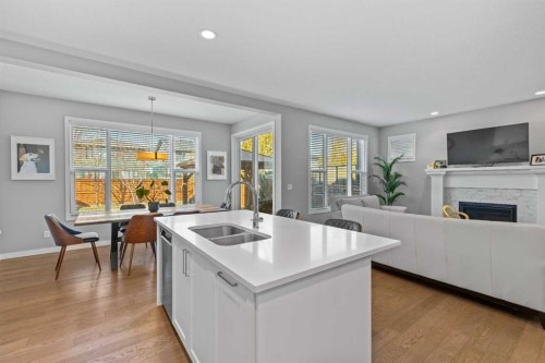 240 Cranbrook Circle Se, Calgary, AB - Indoor With Fireplace