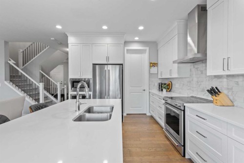 240 Cranbrook Circle Se, Calgary, AB - Indoor Photo Showing Kitchen With Stainless Steel Kitchen With Double Sink With Upgraded Kitchen
