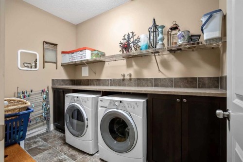 116 Wentworth Square Sw, Calgary, AB - Indoor Photo Showing Laundry Room