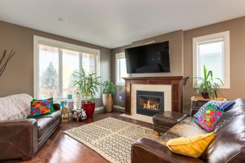 6616 Bowness Road Nw, Calgary, AB - Indoor Photo Showing Living Room With Fireplace