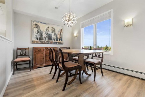 404-7239 Sierra Morena Boulevard Sw, Calgary, AB - Indoor Photo Showing Dining Room