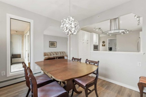 404-7239 Sierra Morena Boulevard Sw, Calgary, AB - Indoor Photo Showing Dining Room