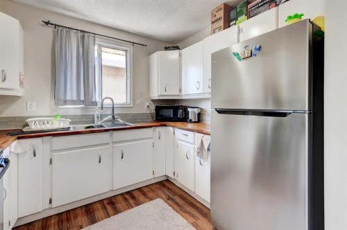 5 Fonda Drive Se, Calgary, AB - Indoor Photo Showing Kitchen With Double Sink