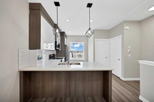 612 Red Sky Villas Ne, Calgary, AB - Indoor Photo Showing Kitchen With Double Sink