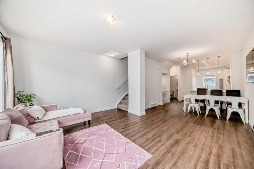 208-15 Evanscrest Park Nw, Calgary, AB - Indoor Photo Showing Living Room