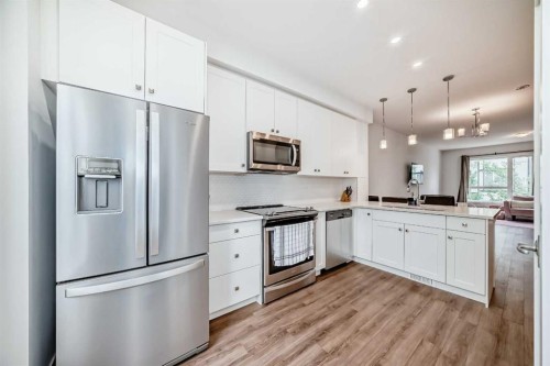 208-15 Evanscrest Park Nw, Calgary, AB - Indoor Photo Showing Kitchen With Stainless Steel Kitchen With Upgraded Kitchen