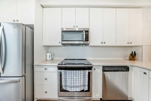 208-15 Evanscrest Park Nw, Calgary, AB - Indoor Photo Showing Kitchen With Stainless Steel Kitchen