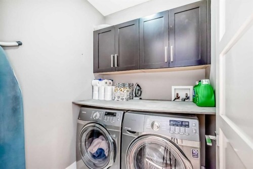2-413 25 Avenue Ne, Calgary, AB - Indoor Photo Showing Laundry Room