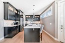 2-413 25 Avenue Ne, Calgary, AB  - Indoor Photo Showing Kitchen With Double Sink With Upgraded Kitchen 