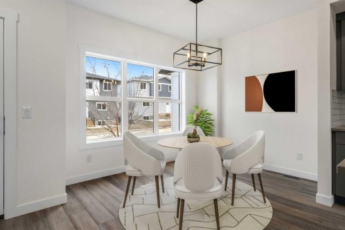 1206-525 River Heights Drive, Cochrane, AB - Indoor Photo Showing Dining Room