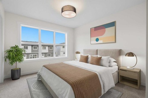 1206-525 River Heights Drive, Cochrane, AB - Indoor Photo Showing Bedroom