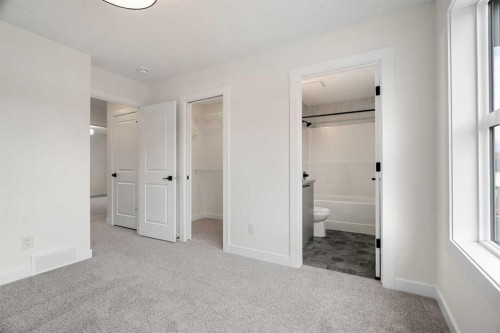 1206-525 River Heights Drive, Cochrane, AB - Indoor Photo Showing Other Room