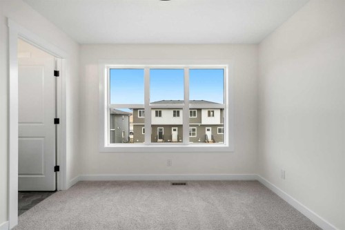 1206-525 River Heights Drive, Cochrane, AB - Indoor Photo Showing Other Room