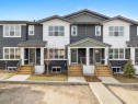 1206-525 River Heights Drive, Cochrane, AB  - Outdoor With Facade 