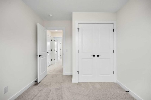 1206-525 River Heights Drive, Cochrane, AB - Indoor Photo Showing Other Room