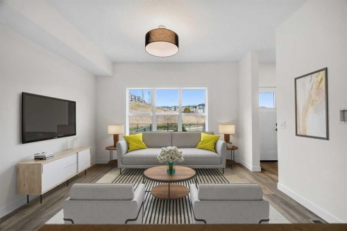 1206-525 River Heights Drive, Cochrane, AB - Indoor Photo Showing Living Room