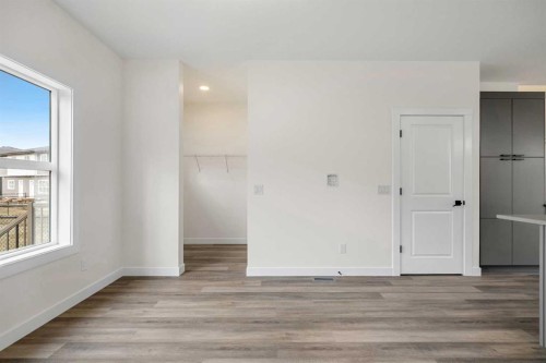 1206-525 River Heights Drive, Cochrane, AB - Indoor Photo Showing Other Room
