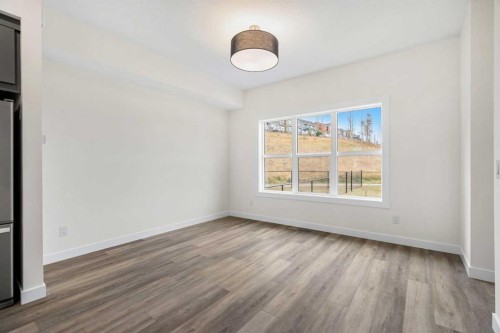 1206-525 River Heights Drive, Cochrane, AB - Indoor Photo Showing Other Room