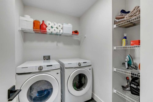 941 Cobblemore Common Sw, Airdrie, AB - Indoor Photo Showing Laundry Room