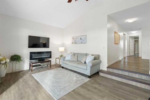 47 Copperstone Mews Se, Calgary, AB - Indoor Photo Showing Living Room