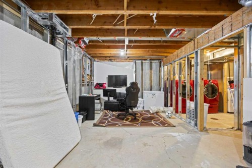 502 Signal Hill Green Sw, Calgary, AB - Indoor Photo Showing Basement